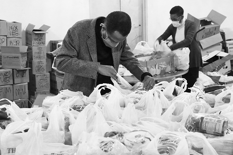 2020 : Food Lines : Seventh Day Adventists Help the Needy : Streetlife : New York City : Times Square : Richard Moore : Photographer : Photojournalist